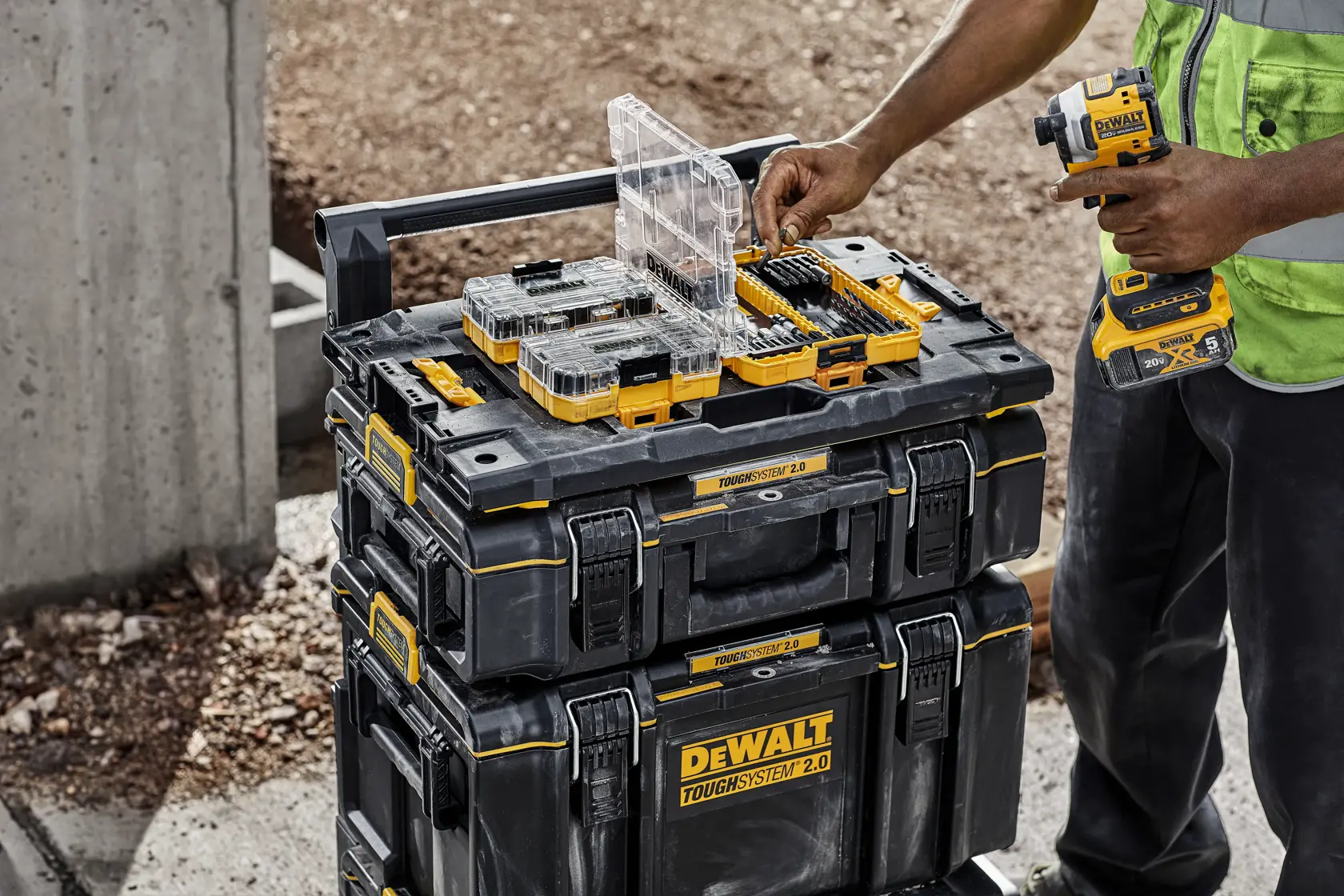Flat black DEWALT photography case with yellow accents, durable plastic, secure latches, designed for tool storage.